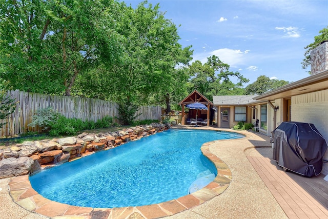 view of pool with grilling area