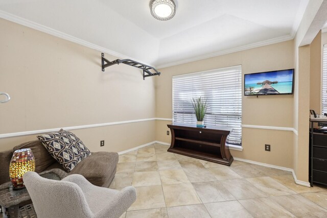 foyer featuring crown molding, ceiling fan with notable chandelier, and light tile patterned floors