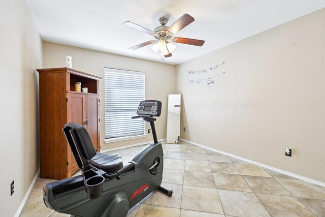 bedroom featuring light tile patterned flooring and ceiling fan