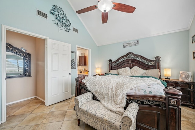 bedroom featuring light tile patterned flooring, lofted ceiling, connected bathroom, crown molding, and ceiling fan