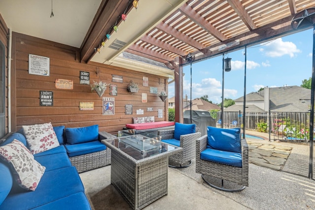 view of patio / terrace with a pergola and an outdoor hangout area