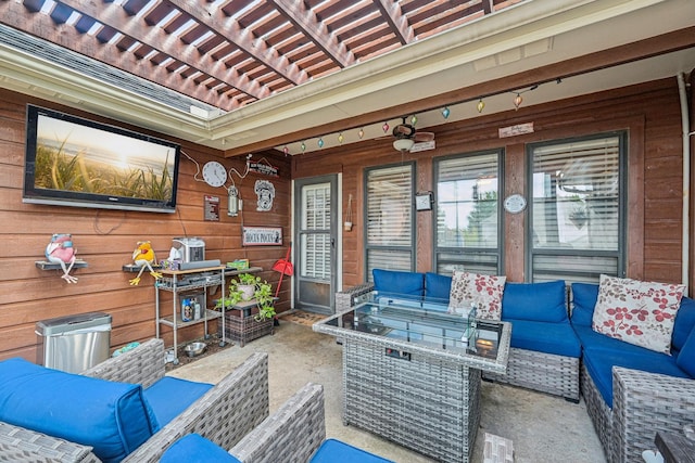 view of patio featuring an outdoor hangout area and a pergola