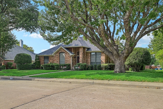 view of front of home with a front yard