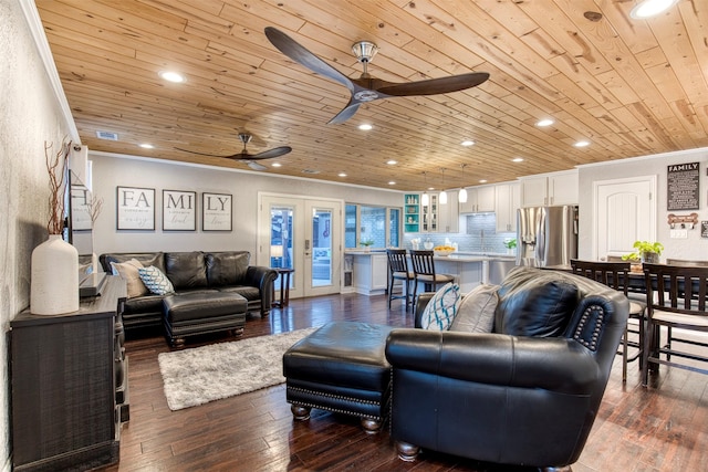 living room featuring crown molding, wood ceiling, ceiling fan, wood-type flooring, and french doors