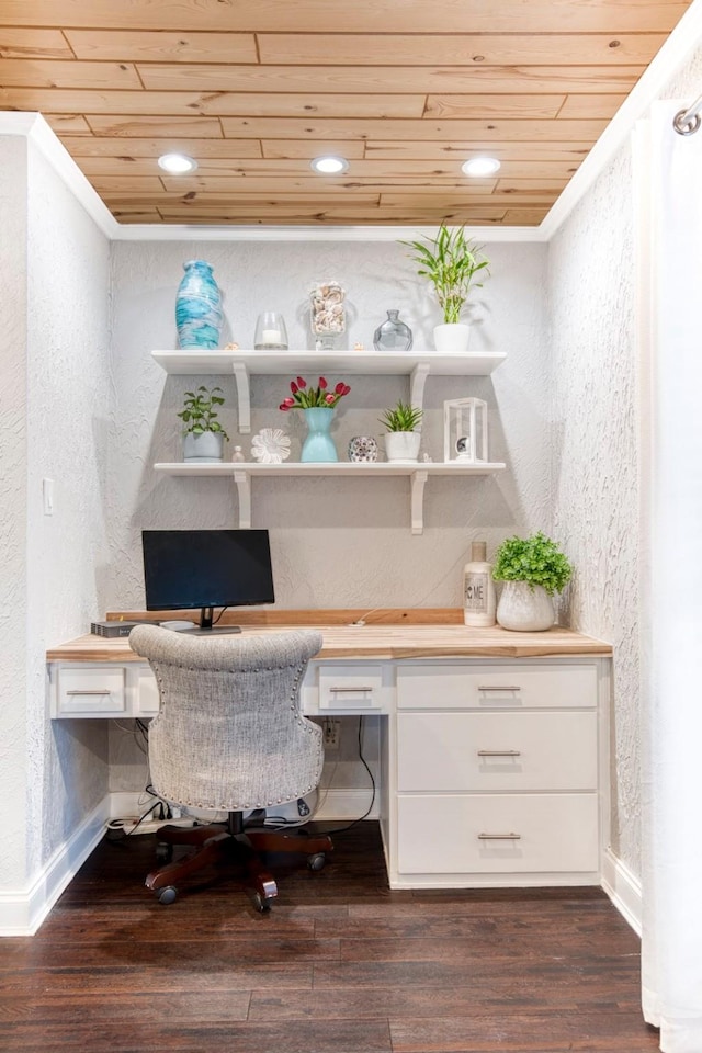 office space featuring wood ceiling, dark hardwood / wood-style floors, and built in desk