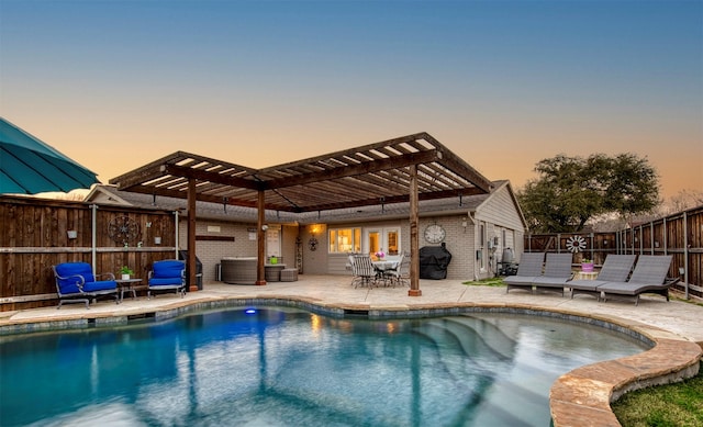 pool at dusk featuring an outdoor living space, a patio area, and a pergola