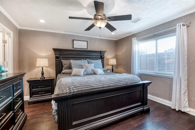 bedroom with ornamental molding, dark hardwood / wood-style flooring, and a textured ceiling