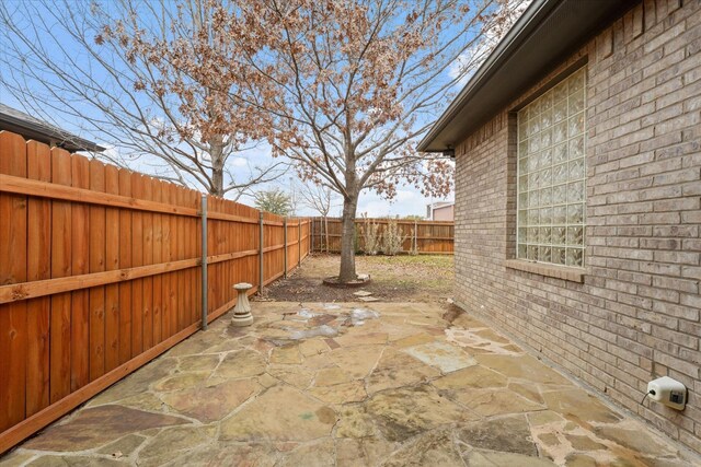 view of patio / terrace featuring ceiling fan