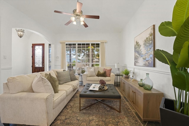 living room with vaulted ceiling and ceiling fan