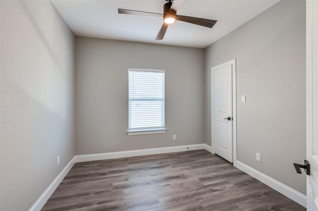 empty room featuring ceiling fan and wood-type flooring