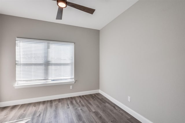 unfurnished room featuring wood-type flooring, ceiling fan, and vaulted ceiling