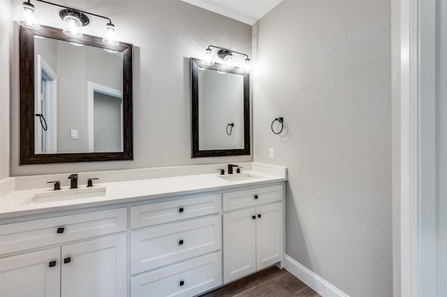 bathroom featuring vanity and hardwood / wood-style floors