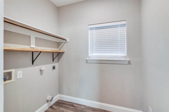 clothes washing area with hardwood / wood-style floors, washer hookup, and hookup for an electric dryer