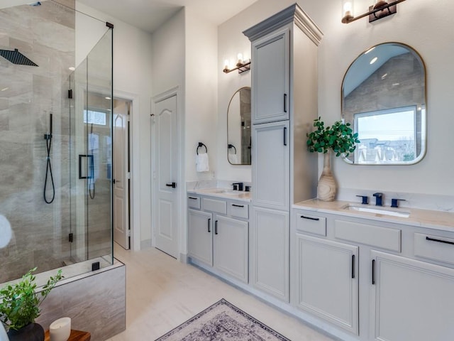 bathroom with vanity and walk in shower