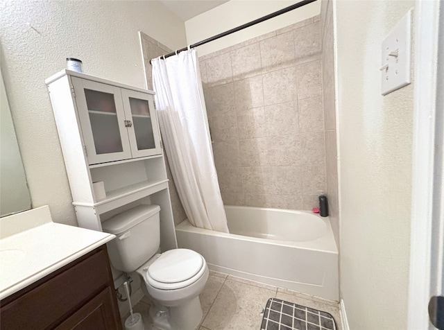 full bathroom featuring shower / tub combo with curtain, vanity, toilet, and tile patterned floors