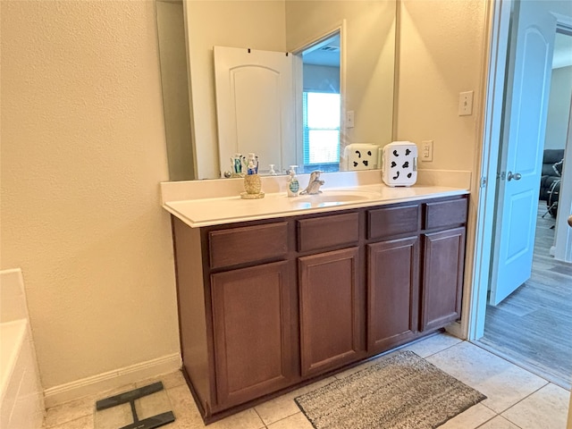 bathroom featuring vanity and tile patterned flooring