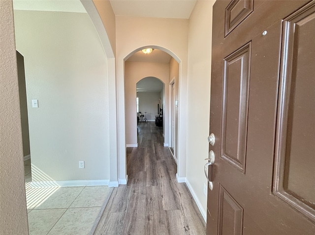 hallway featuring light hardwood / wood-style flooring