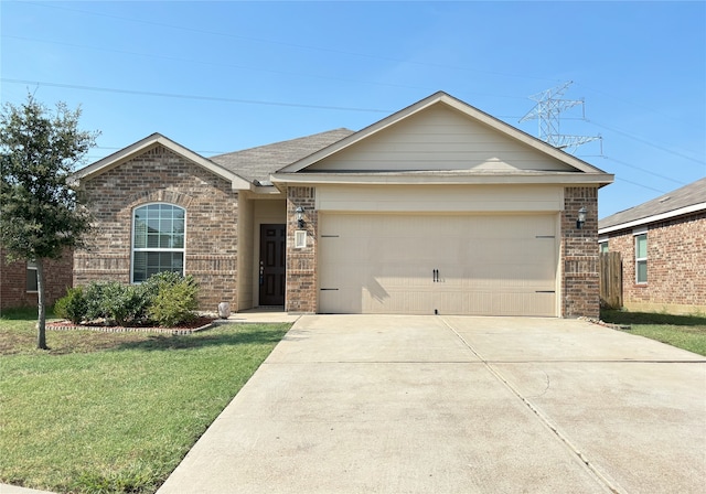 single story home featuring a garage and a front lawn