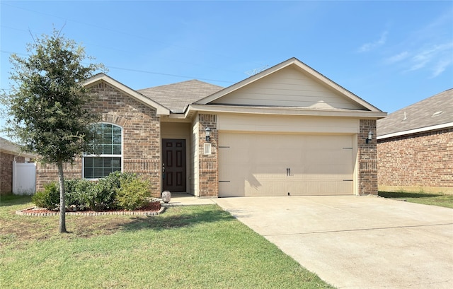 ranch-style home with a garage and a front lawn