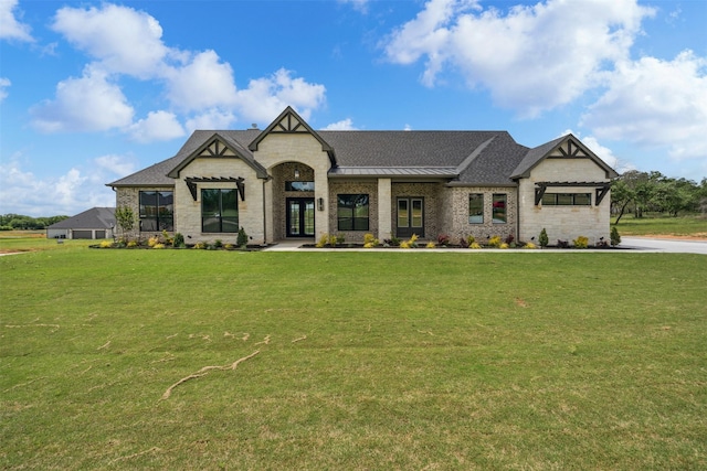 1027 Estancia Blvd, Weatherford, TX 76088 - unfurnished living room with light wood finished floors, baseboards, beamed ceiling, a ceiling fan, and a fireplace