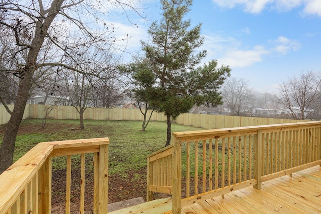 wooden terrace with a yard