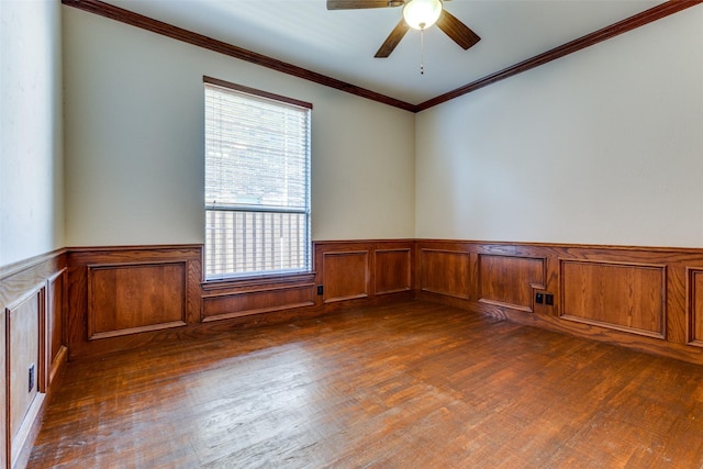 unfurnished room featuring crown molding, ceiling fan, and dark hardwood / wood-style flooring