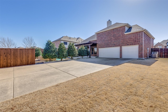 view of home's exterior with a garage