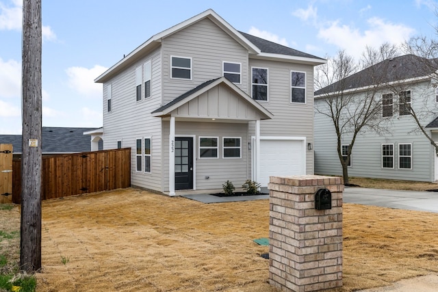 view of front of property with a garage