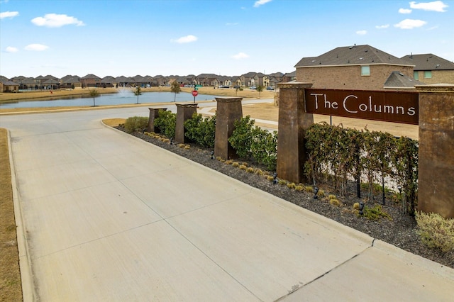 view of home's community featuring a water view