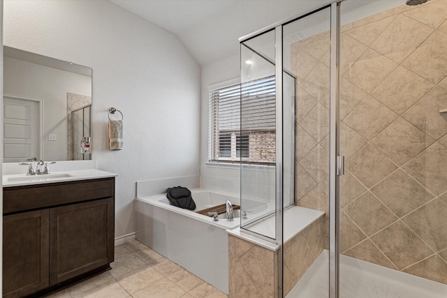 bathroom featuring tile patterned flooring, vanity, separate shower and tub, and lofted ceiling