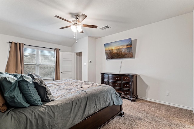 bedroom featuring lofted ceiling, light carpet, and ceiling fan