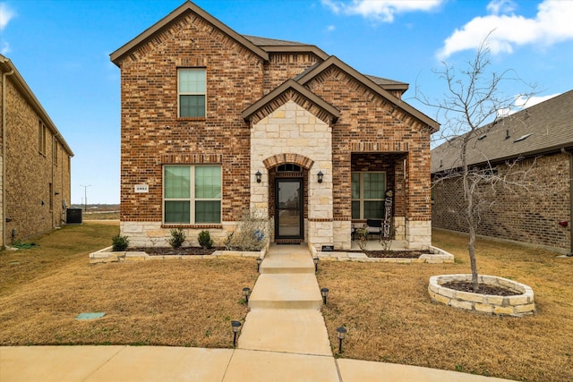 front facade with a front yard