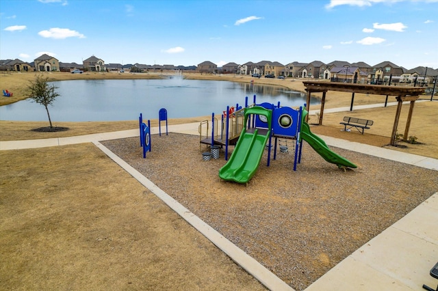 view of playground featuring a water view