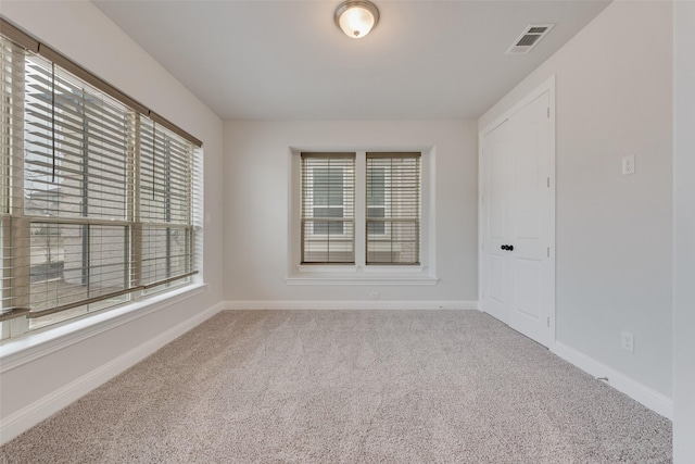 view of carpeted spare room