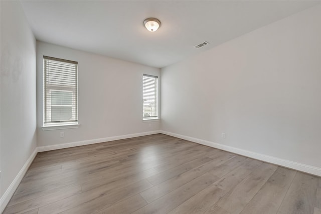 empty room featuring light hardwood / wood-style floors