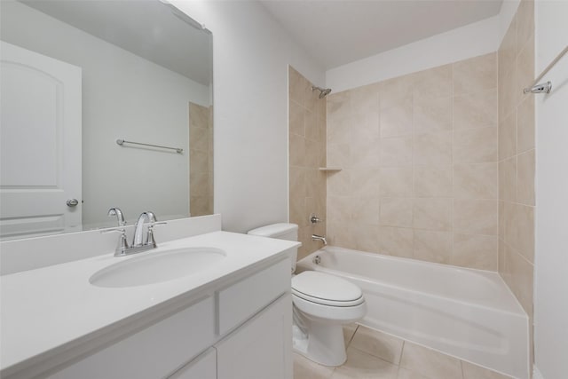 full bathroom featuring vanity, toilet, tiled shower / bath combo, and tile patterned flooring