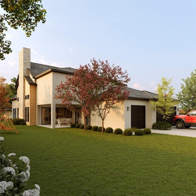 back of house with a yard, a playground, and a patio area