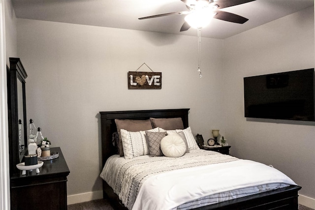 bedroom featuring baseboards and a ceiling fan