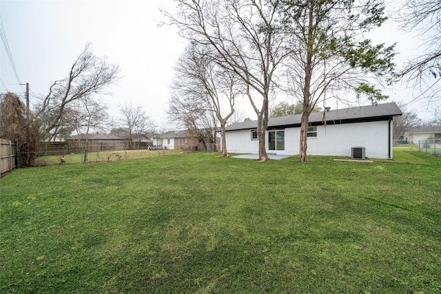 view of yard with central AC unit