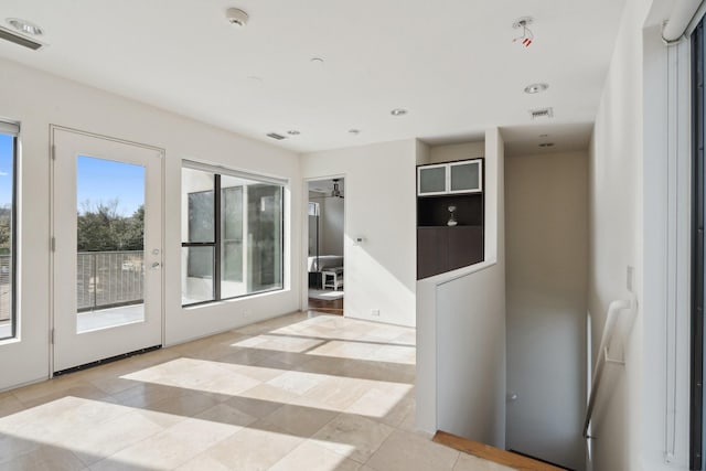 interior space featuring light tile patterned floors