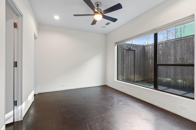 unfurnished room featuring ceiling fan