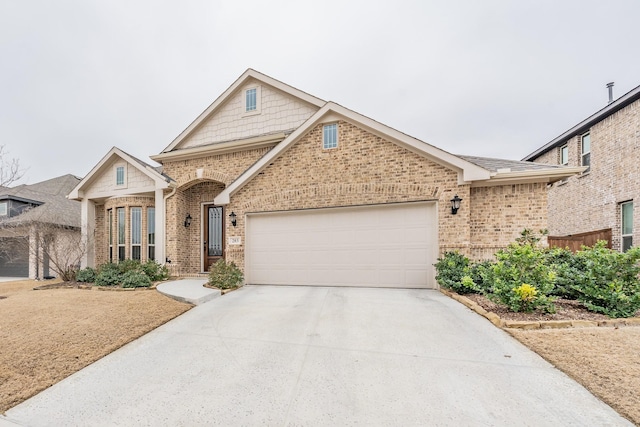 view of front facade with a garage, driveway, and brick siding