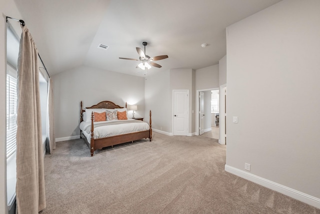 bedroom with baseboards, visible vents, vaulted ceiling, and carpet flooring