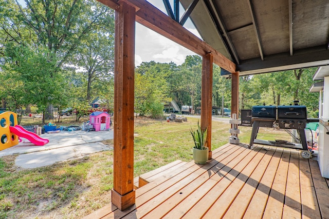 deck featuring a lawn