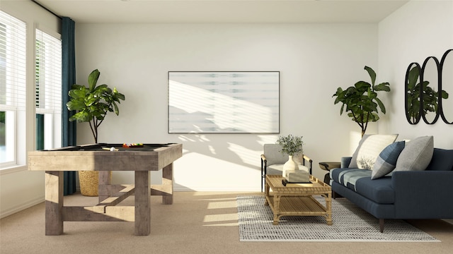 sitting room featuring carpet and a wealth of natural light