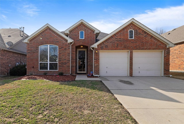 view of property with a garage and a front lawn