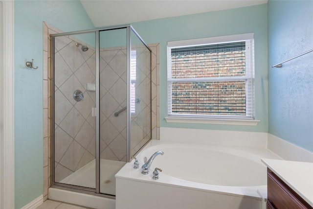 bathroom featuring independent shower and bath and vanity