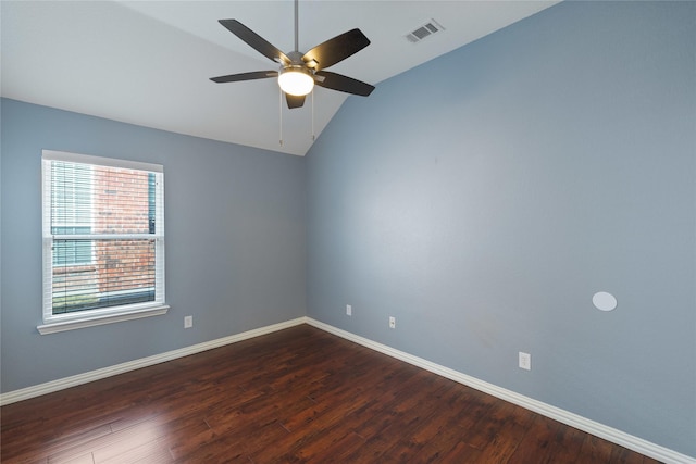 empty room with wood-type flooring, vaulted ceiling, and ceiling fan