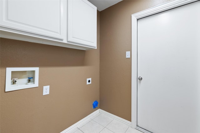 laundry area with cabinets, washer hookup, light tile patterned floors, and electric dryer hookup