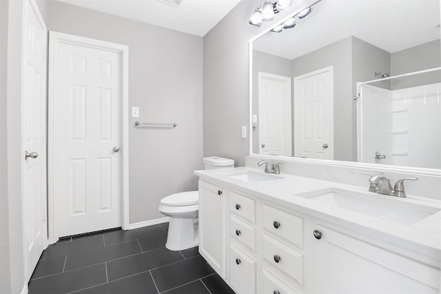 full bathroom with vanity, toilet, shower / washtub combination, and tile patterned flooring